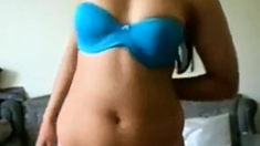 Girl dancing with blue bra