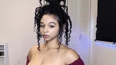 Busty Ebony masturbating with her Lush