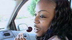Sexy ebony schoolgirl Little Coco blows a white man's cock in the car