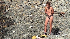 Voyeur girl naked on public beach